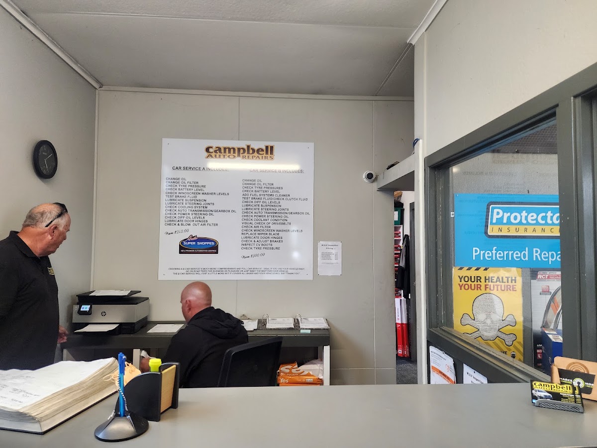 Reception with the Campbell Auto Repairs service menu board